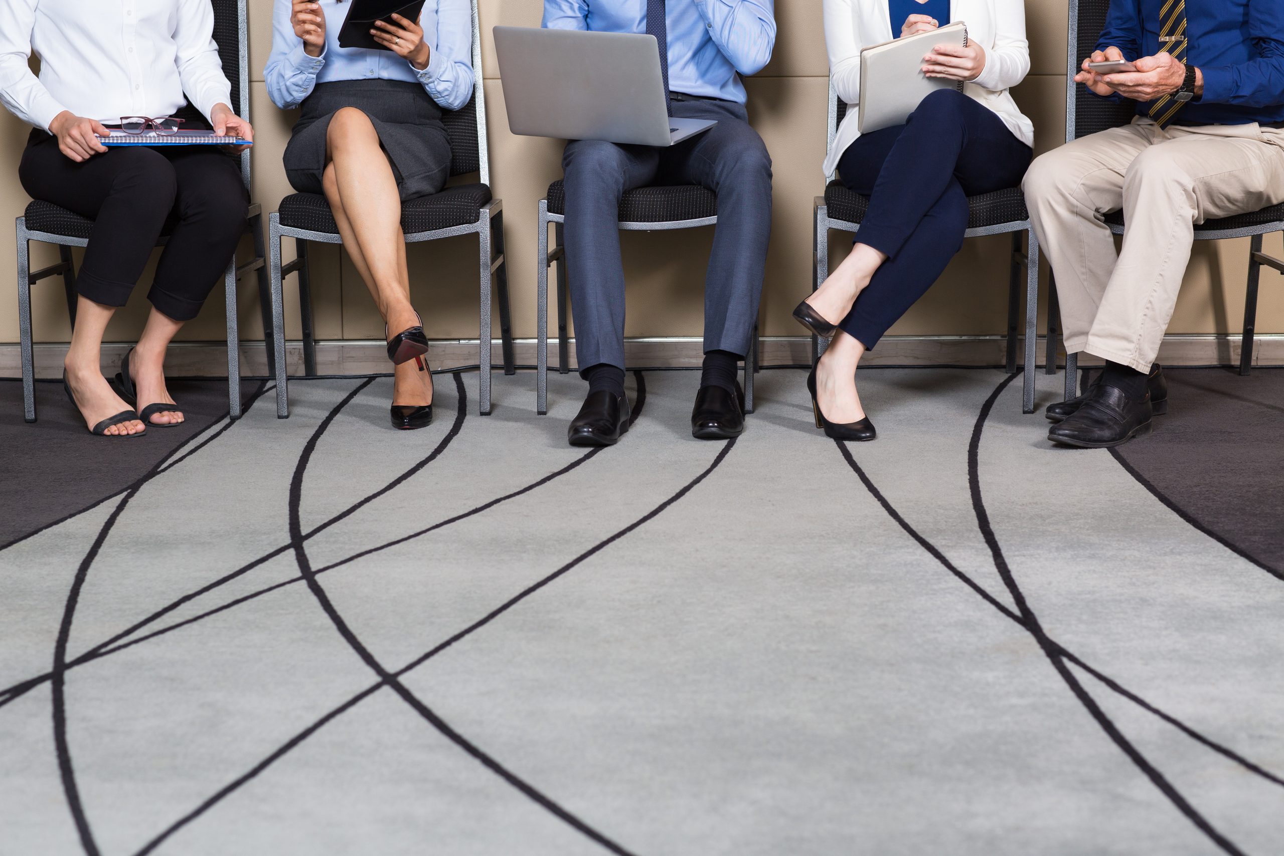 cropped view business people sitting row scaled 1